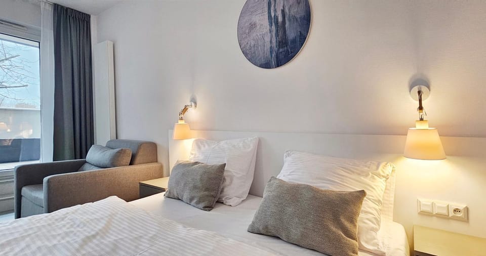 HOLIDAY HOME Aquamarina Prima 04 z tarasem przy plaży Apartment in Miedzyzdroje