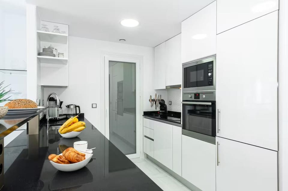 Kitchen or kitchenette, oven, stove