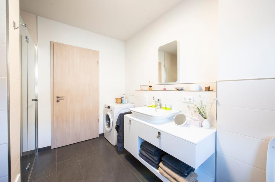 Bathroom, towels, washing machine