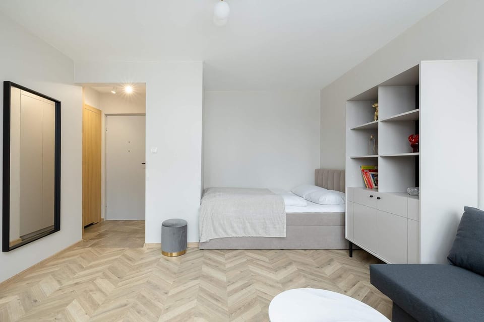 Bed, Living room, Seating area, Bedroom