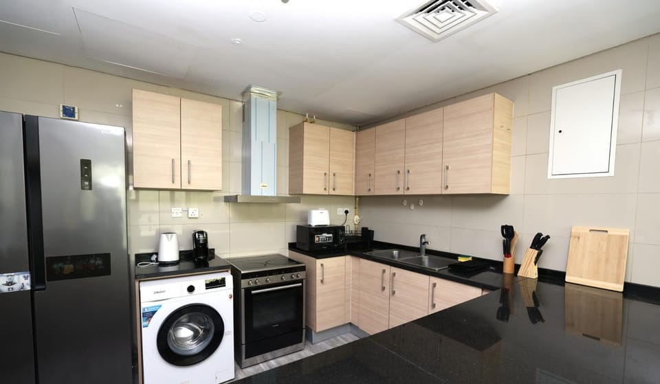 Coffee/tea facilities, oven, stove, toaster, washing machine