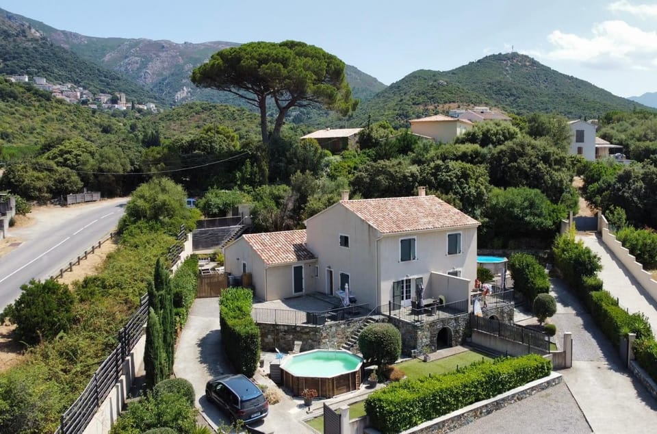 Property building, Nearby landmark, Spring, Neighbourhood, Natural landscape, Mountain view, Street view, Swimming pool