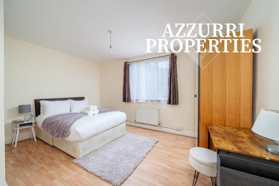 Bed, Seating area, Bedroom, towels, wardrobe