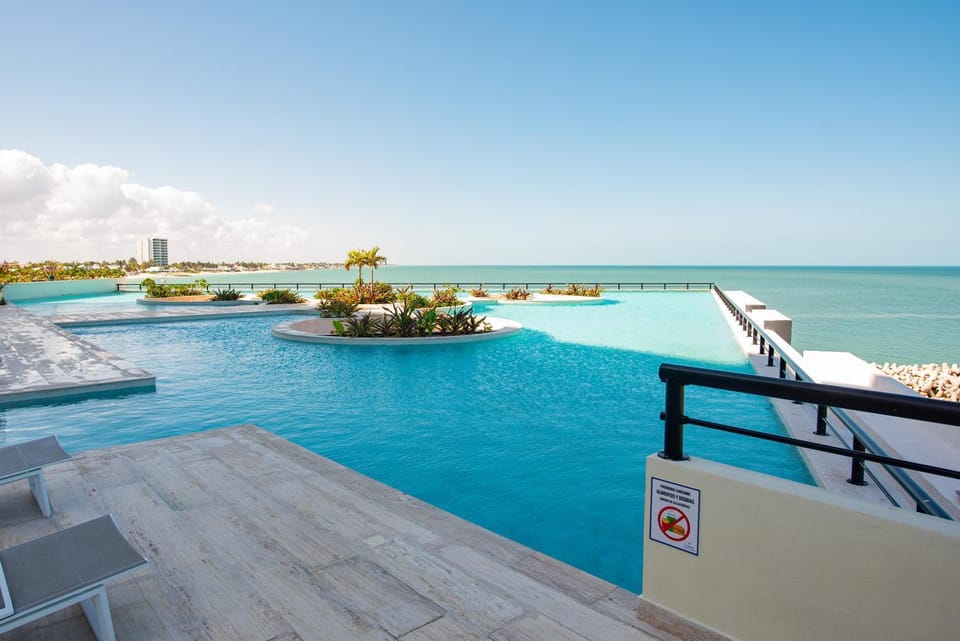 Property building, Nearby landmark, Natural landscape, Sea view, Swimming pool, sunbed