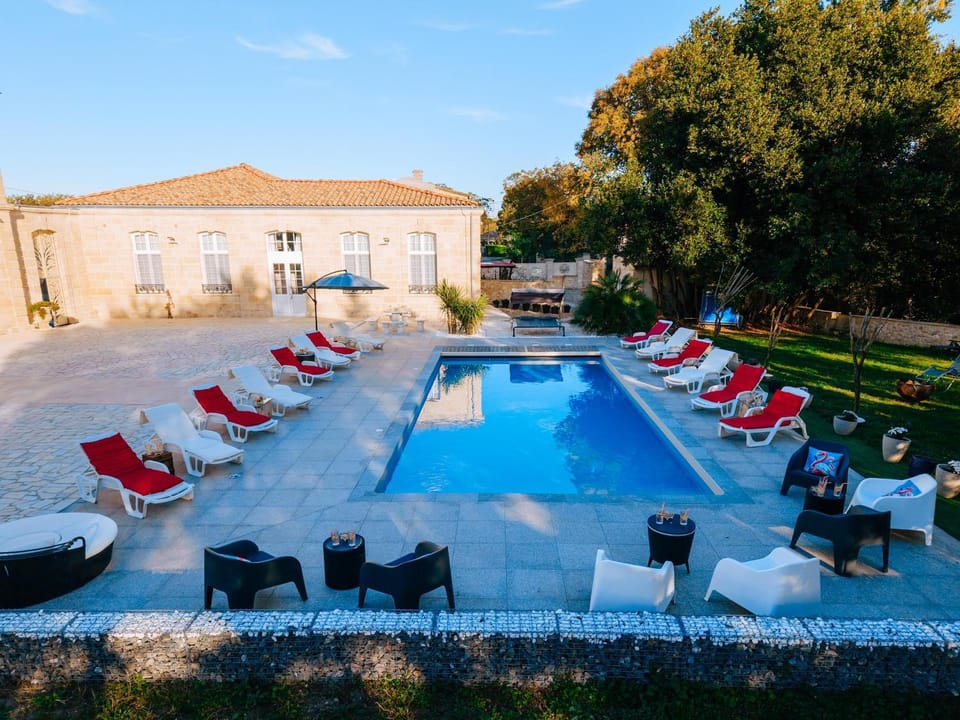Property building, Day, Pool view, Swimming pool, sunbed