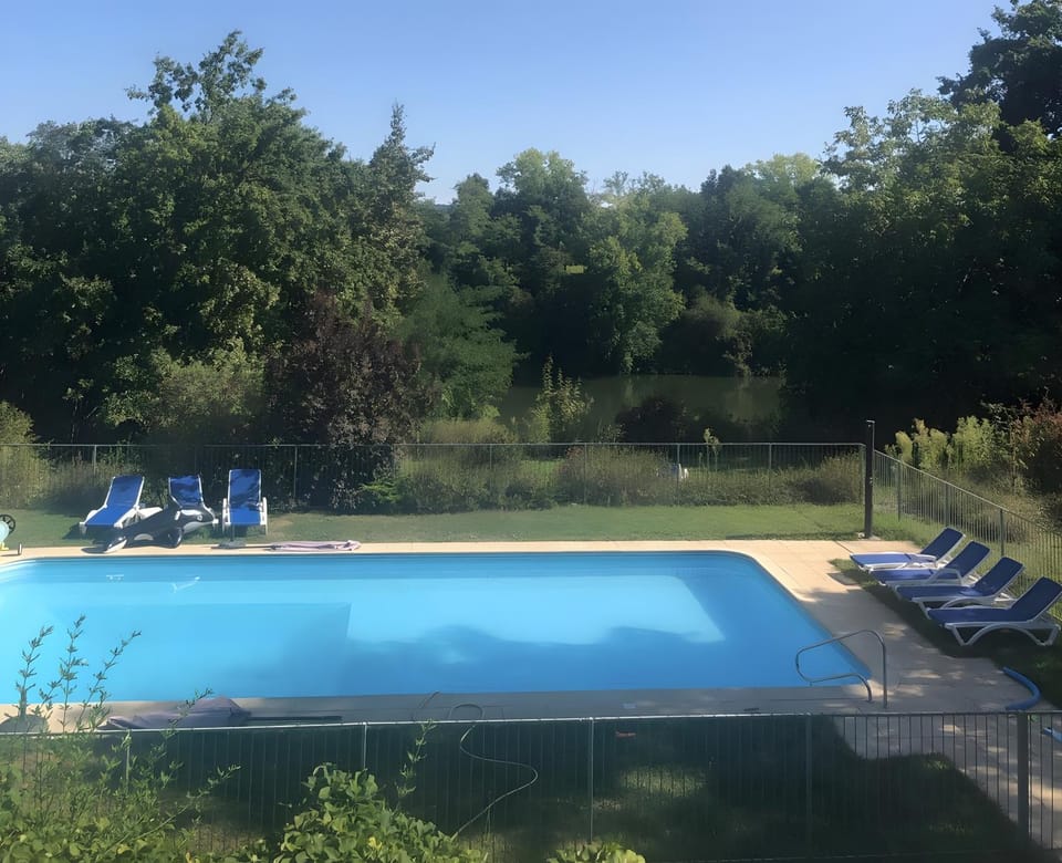 Property building, Living room, Swimming pool