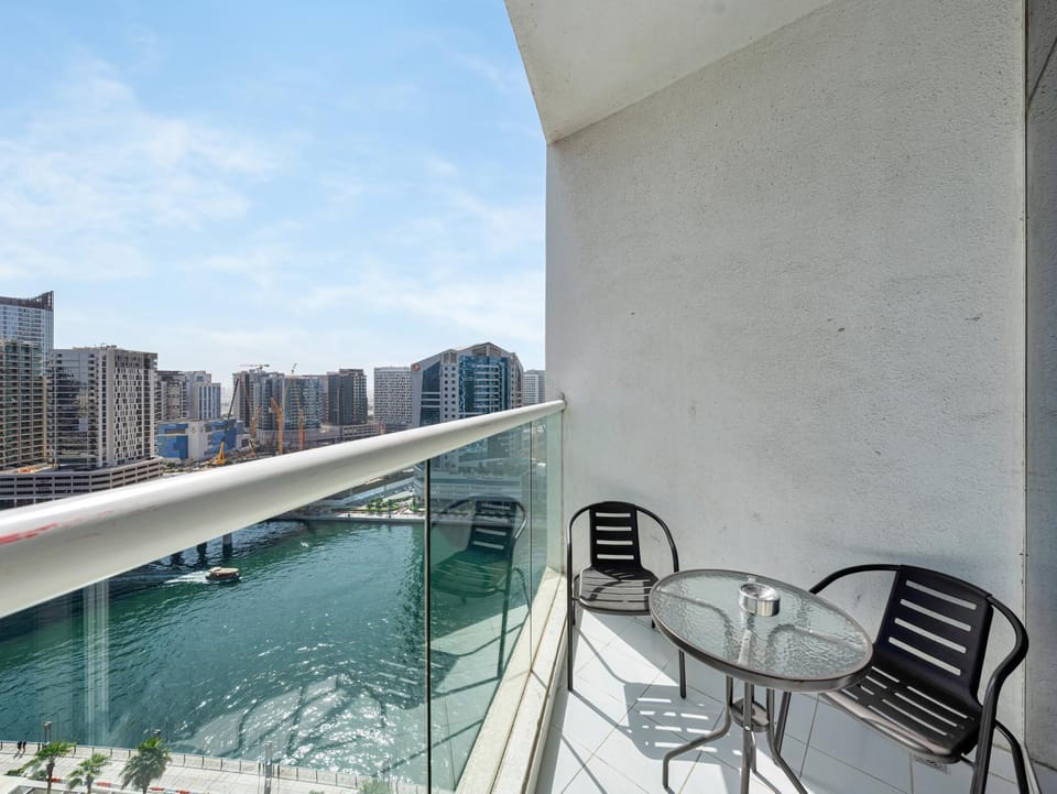 Property building, Patio, Day, Natural landscape, View (from property/room), Balcony/Terrace, Living room, Seating area, Dining area, City view, Lake view, River view