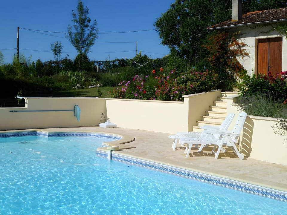 Property building, Living room, Swimming pool
