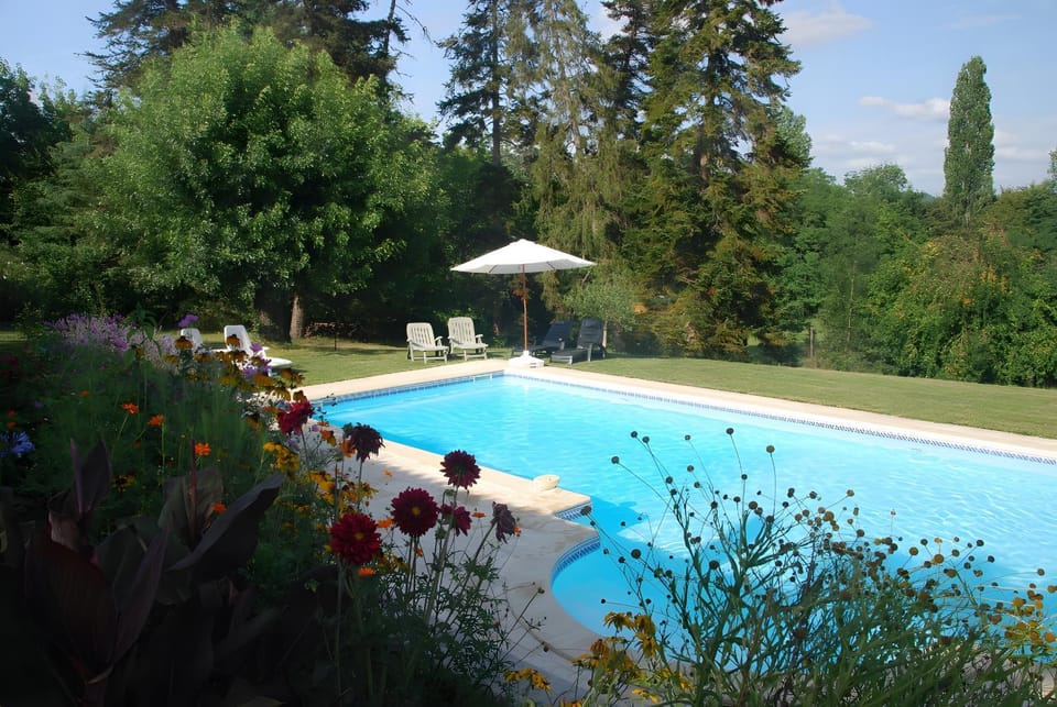 Property building, Living room, Swimming pool