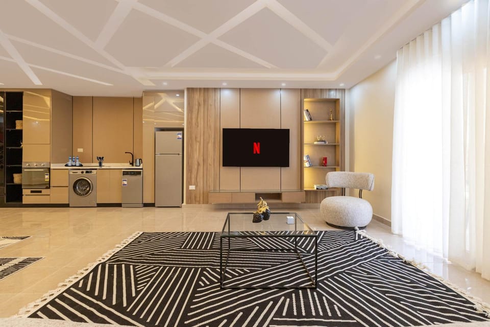 Studio - King Bed - Near AUC - All-Day Security & Reception Apartment in New Cairo City