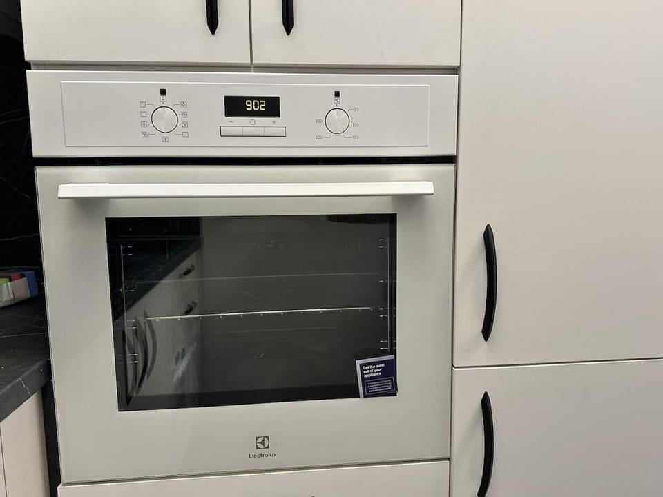 Kitchen or kitchenette, oven