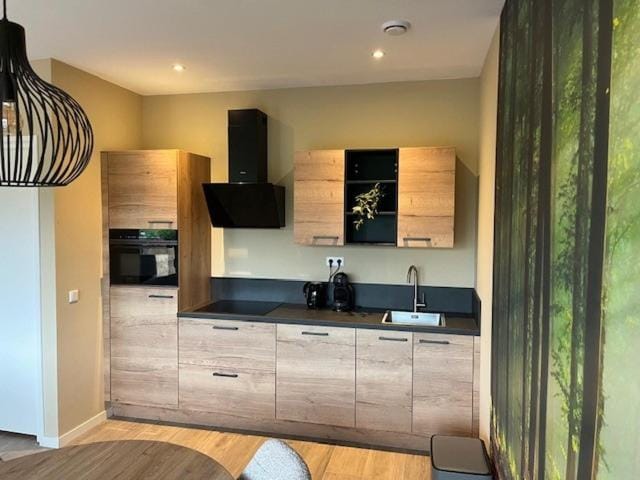 Kitchen or kitchenette, dishwasher, oven, stove