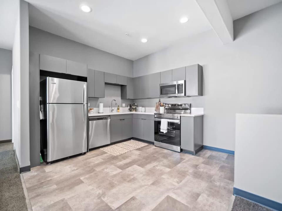 Kitchen or kitchenette, dishwasher, oven, stove, toaster