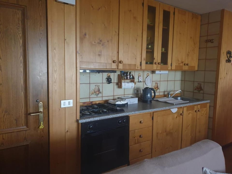 Kitchen or kitchenette, stove