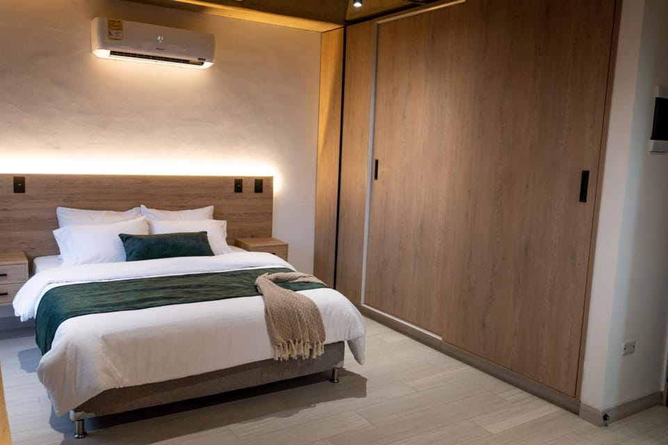 Bed, wardrobe, air conditioner