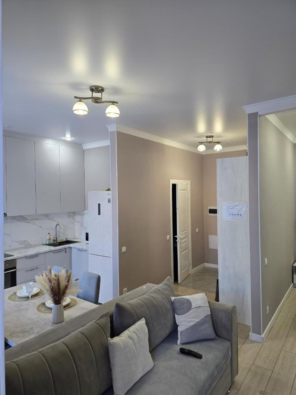 Seating area, wardrobe, kitchen