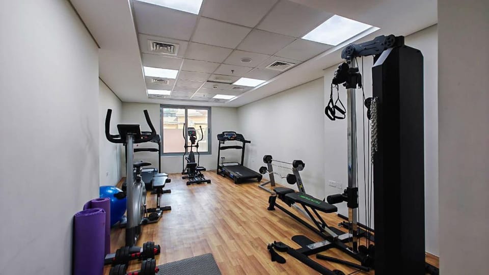 Free housekeeping visits during your stay - StayShort - Stylish & Captivating Studio in JVC Apartment in Dubai