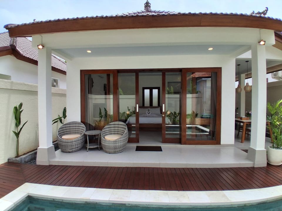 Property building, Day, View (from property/room), Seating area, Pool view, Swimming pool
