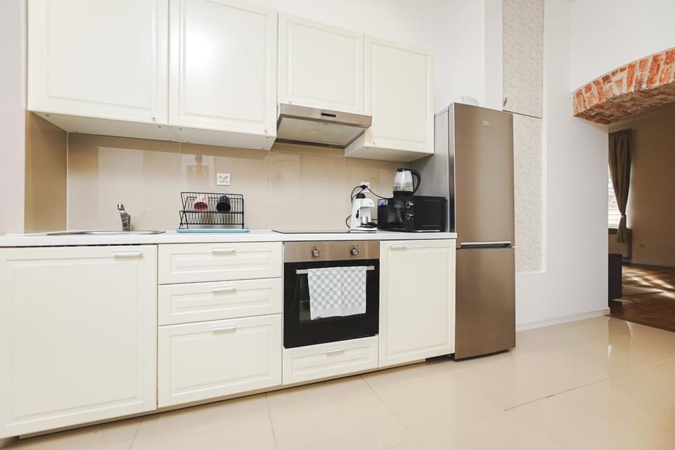 Kitchen or kitchenette, oven, stove, toaster