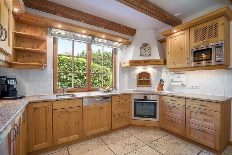 Kitchen or kitchenette, dishwasher, oven, stove, toaster