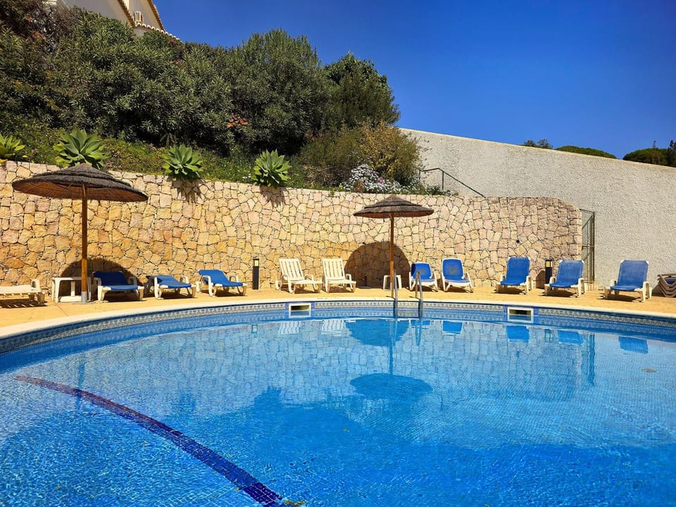 Swimming pool, sunbed