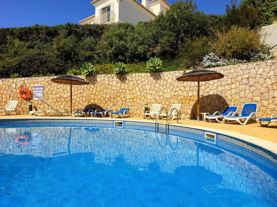 Swimming pool, sunbed