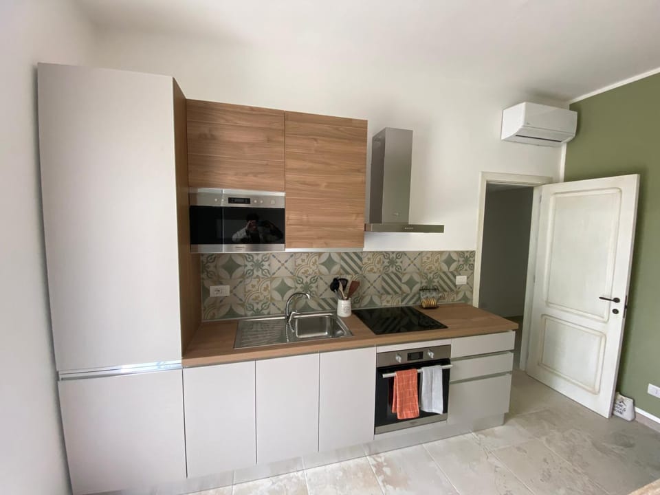 Kitchen or kitchenette, microwave, oven, stove, kitchen