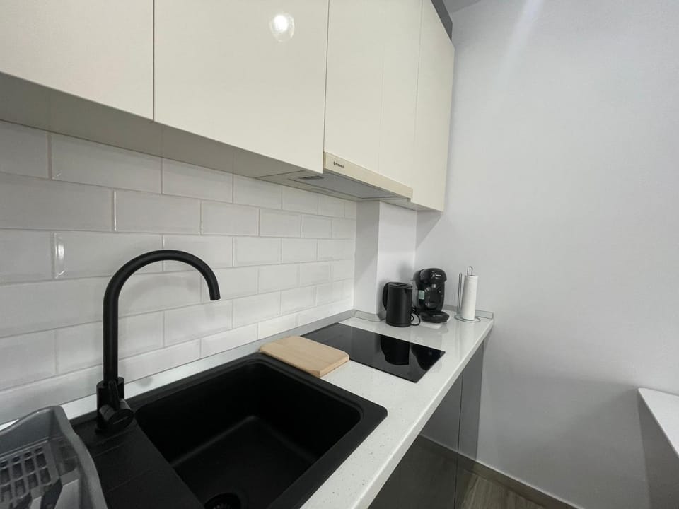 Kitchen or kitchenette, stove