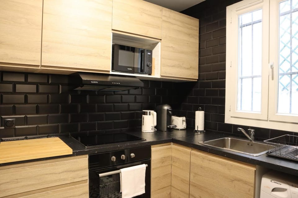 Kitchen or kitchenette, stove, toaster