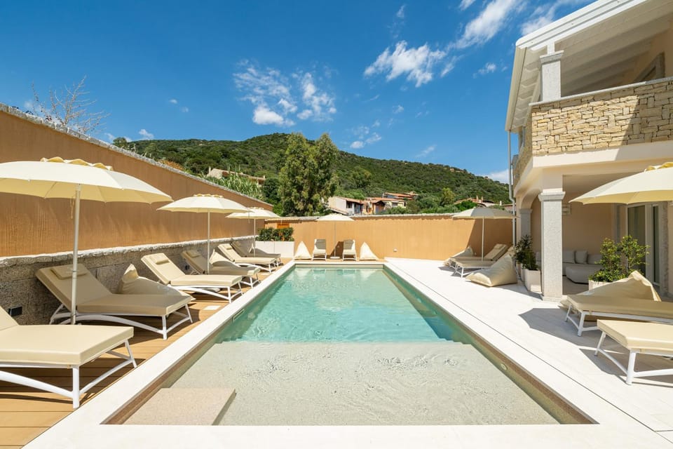 Property building, Living room, Swimming pool