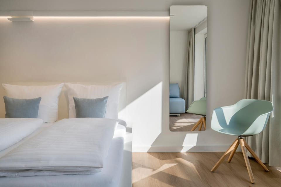 Bed, Living room, Seating area, Bedroom