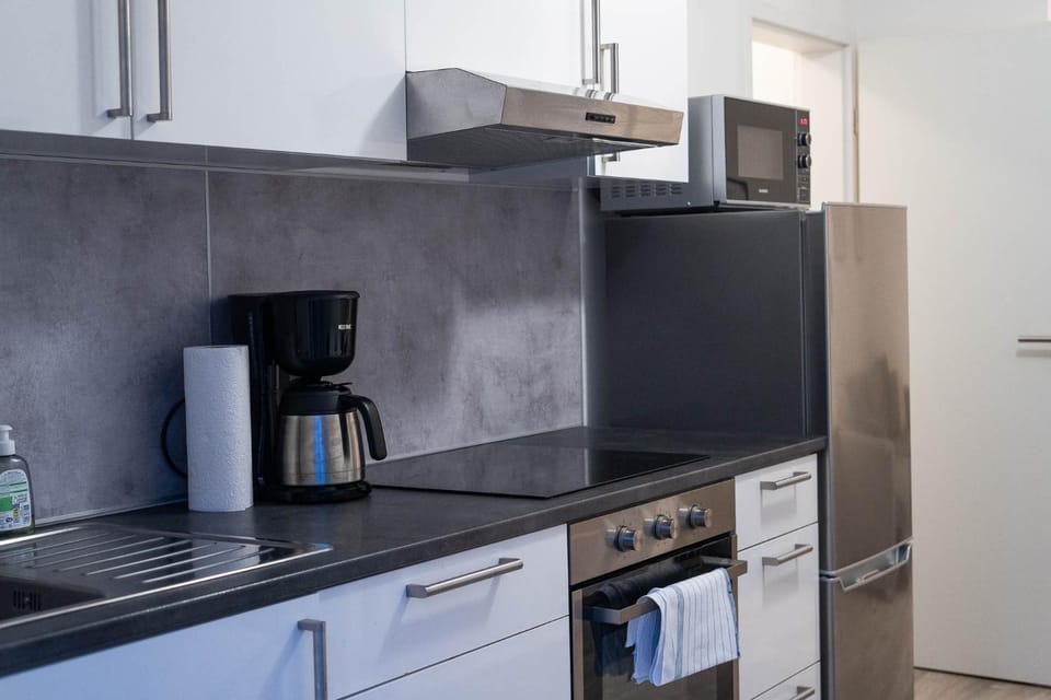 Kitchen or kitchenette, oven, stove, toaster