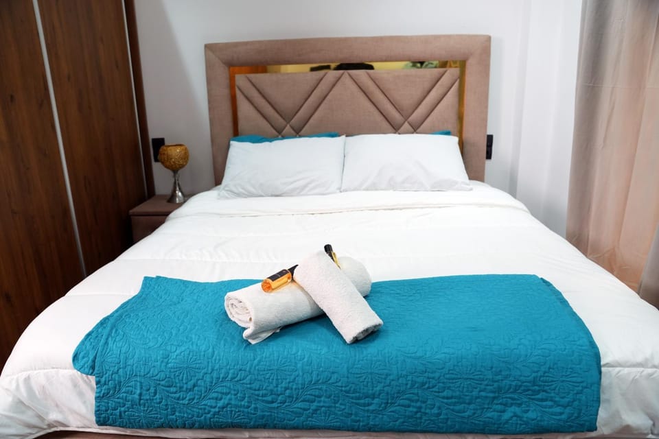 Bed, Photo of the whole room, Bedroom, towels, wardrobe