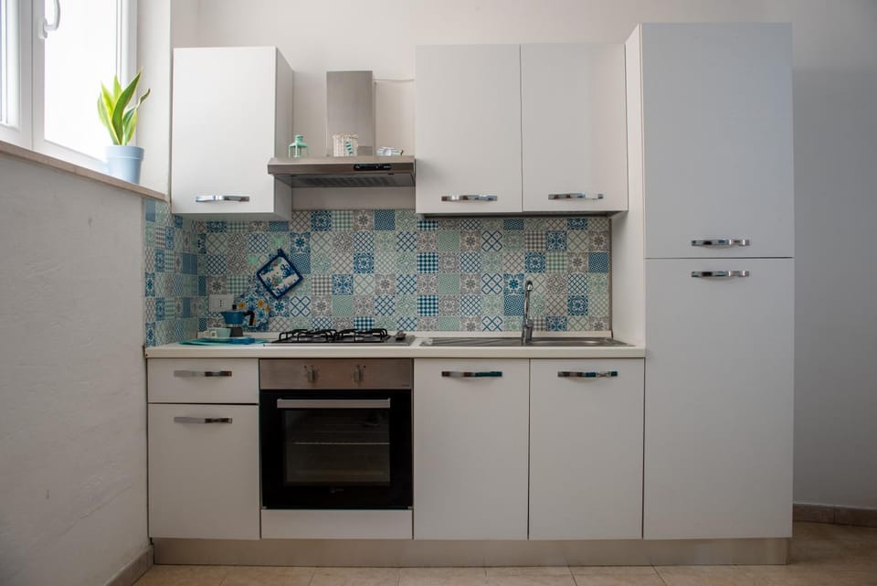 Kitchen or kitchenette, oven, stove