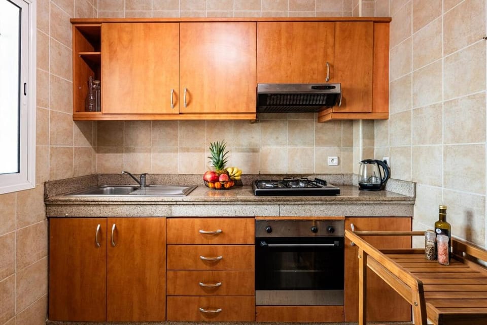 Kitchen or kitchenette, stove