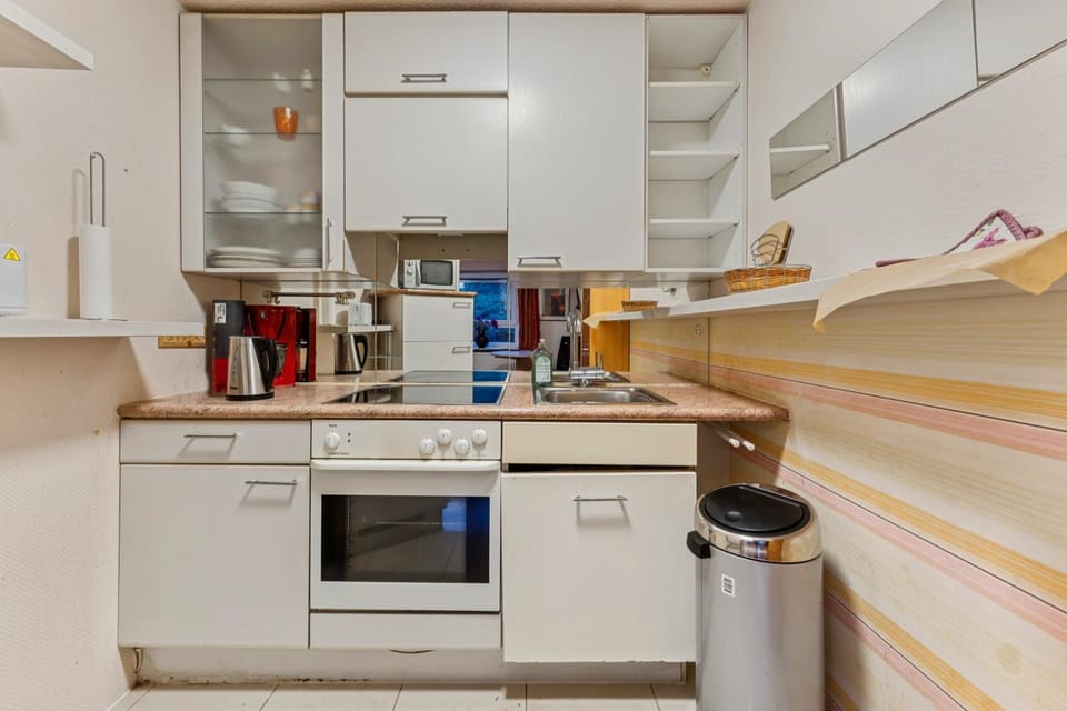 Kitchen or kitchenette, oven, stove, toaster