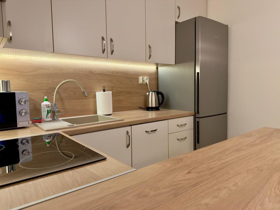 Kitchen or kitchenette, dishwasher, microwave, stove, kitchen