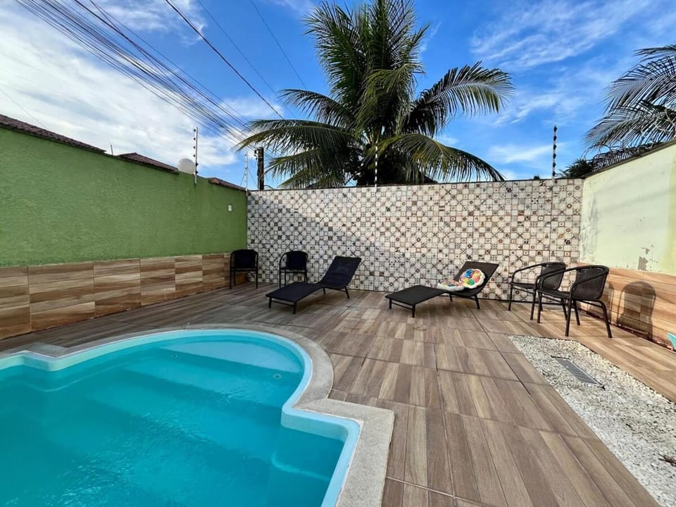 Swimming pool, sunbed