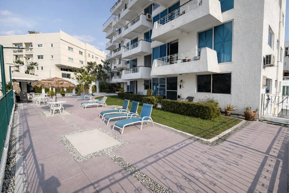 Property building, Patio, Day, View (from property/room), Balcony/Terrace, sunbed