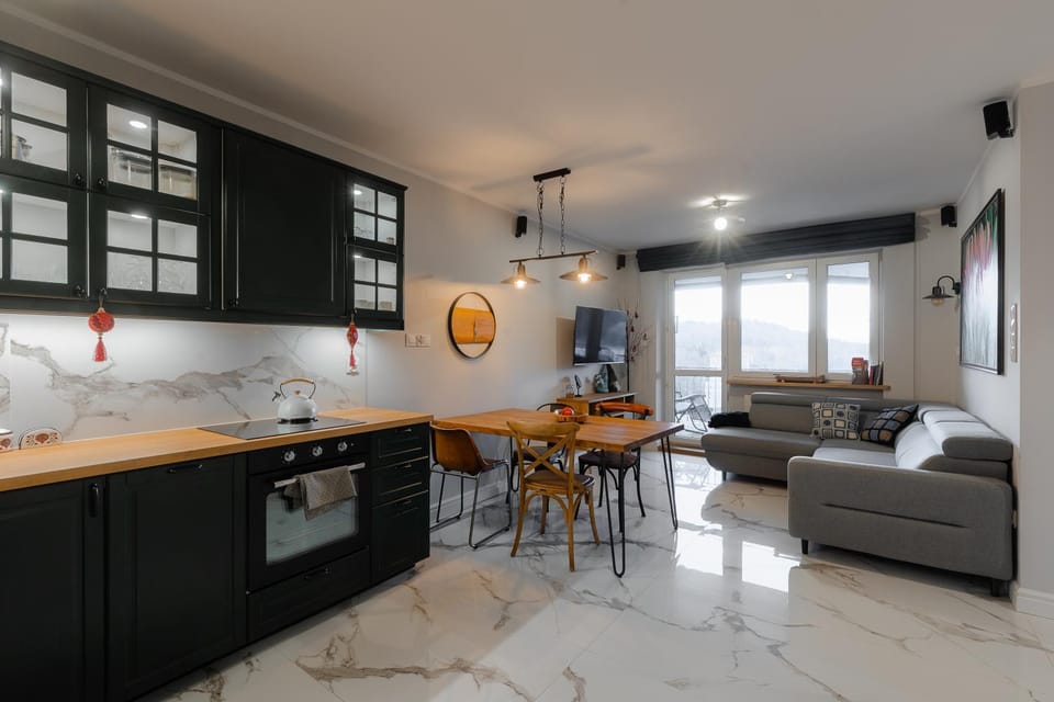 Kitchen or kitchenette, Living room, Seating area, Dining area