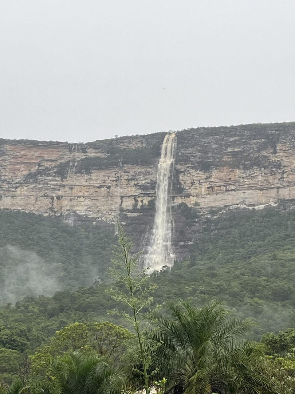 Traditional house in front of the Fundão Waterfall House in State of Bahia