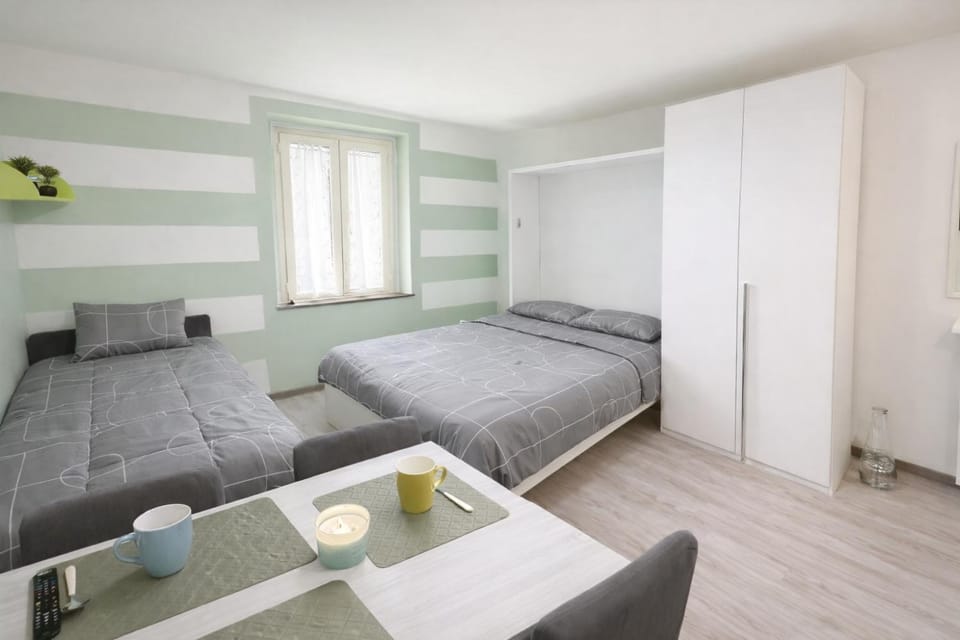 Bed, Living room, Photo of the whole room, Seating area, Bedroom, towels, wardrobe
