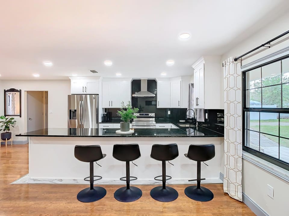 Dining area, dishwasher, oven, stove, toaster, kitchen