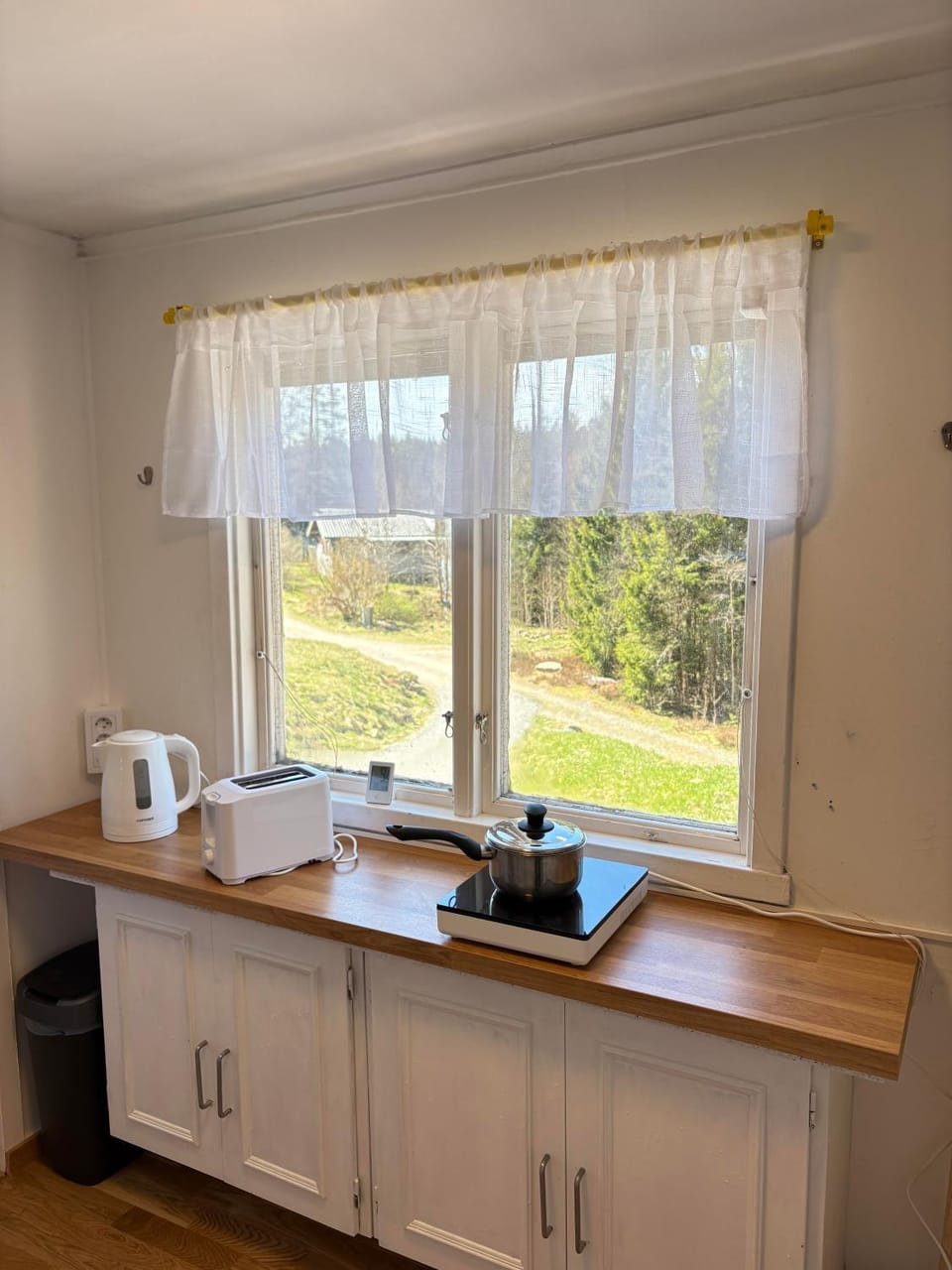 Kitchen or kitchenette, stove, toaster