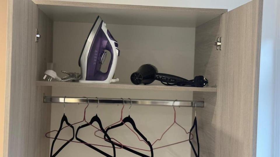 flat iron, furniture, hair dryier, wardrobe