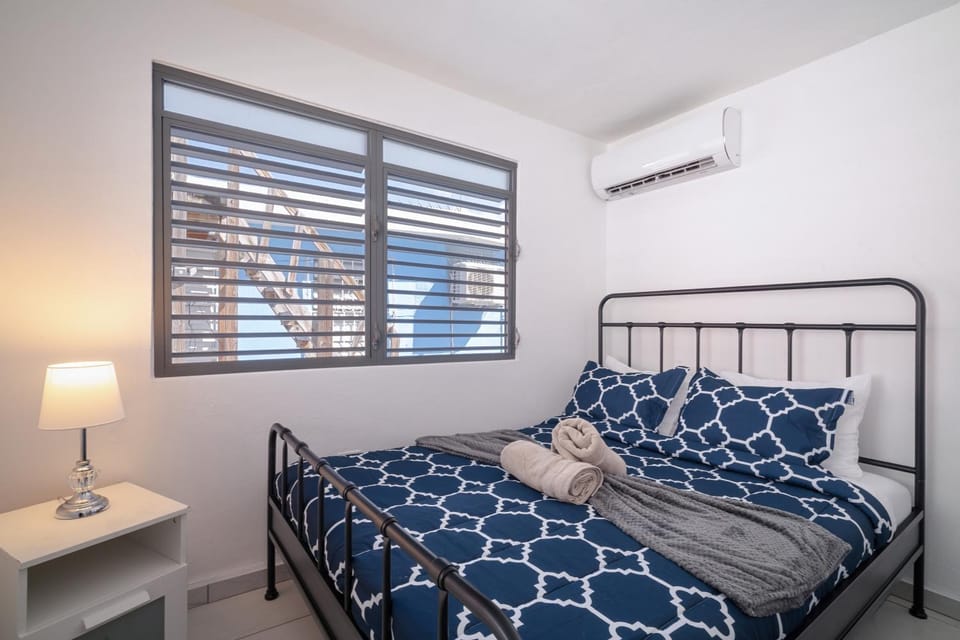 Bed, Photo of the whole room, Bedroom, towels, air conditioner