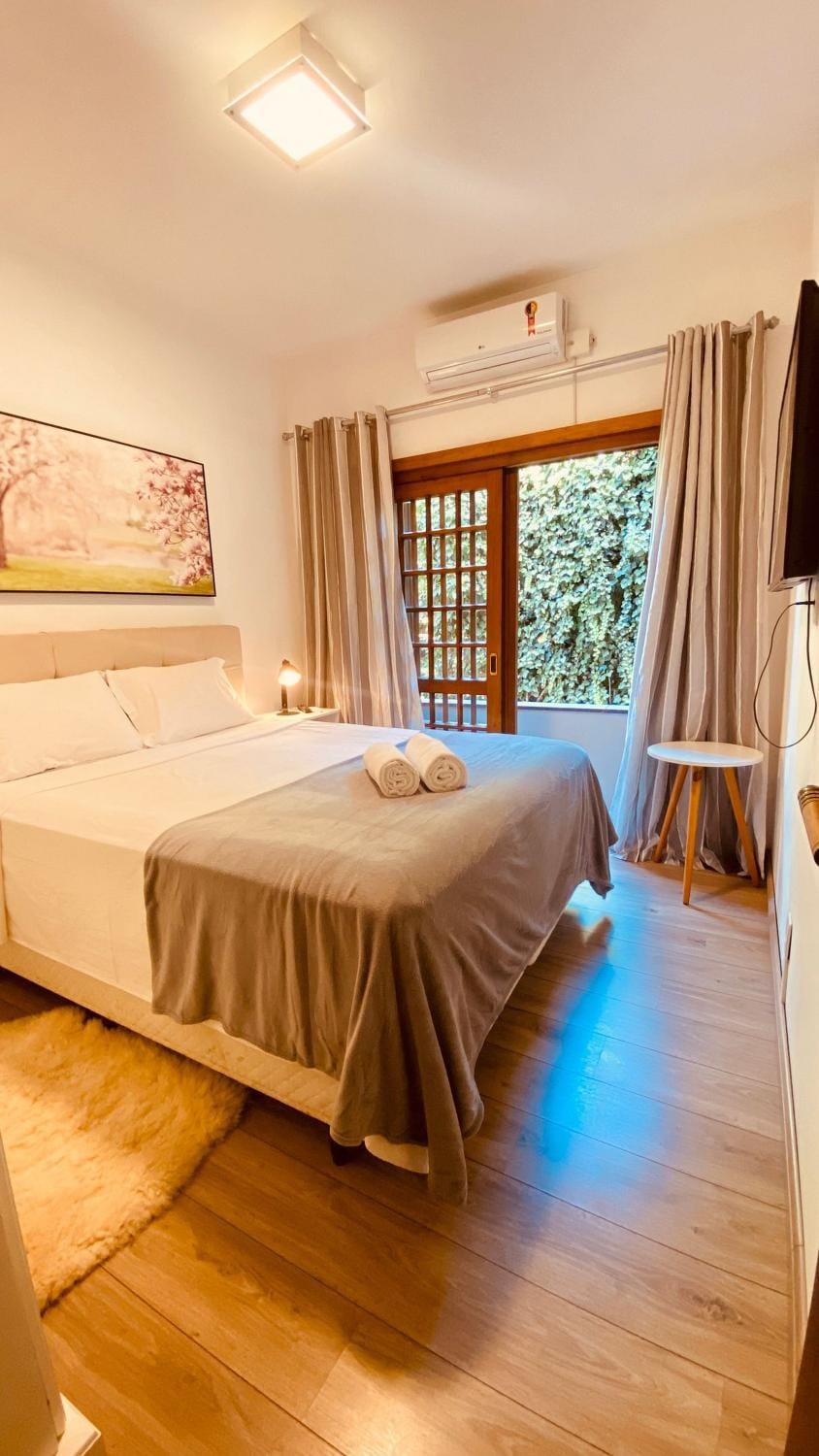 Próximo ao centro, Ar, varanda e churrasqueira! Apartment in Gramado