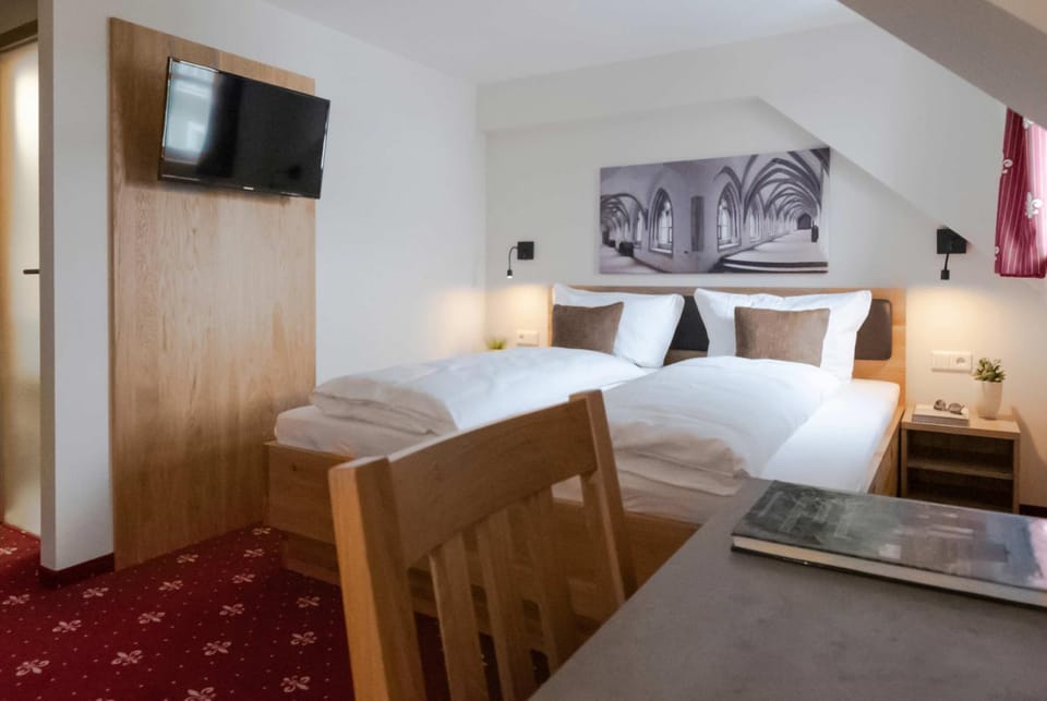 Dreibettzimmer Hahnenkamm 12 Hotel in Bavaria