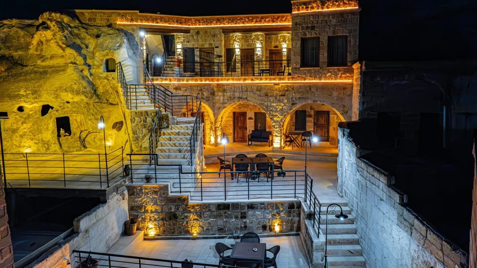Property building, Patio, Night, View (from property/room), Balcony/Terrace, Living room, Seating area, Landmark view