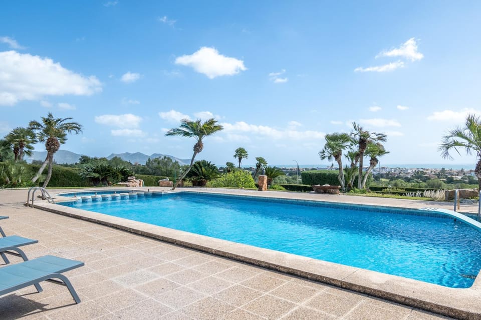 Property building, Living room, Swimming pool